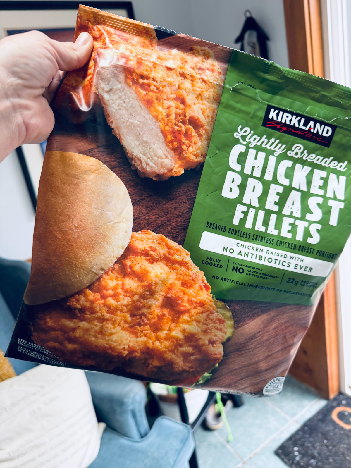 bag of lightly breaded kirkland chicken breast fillets.