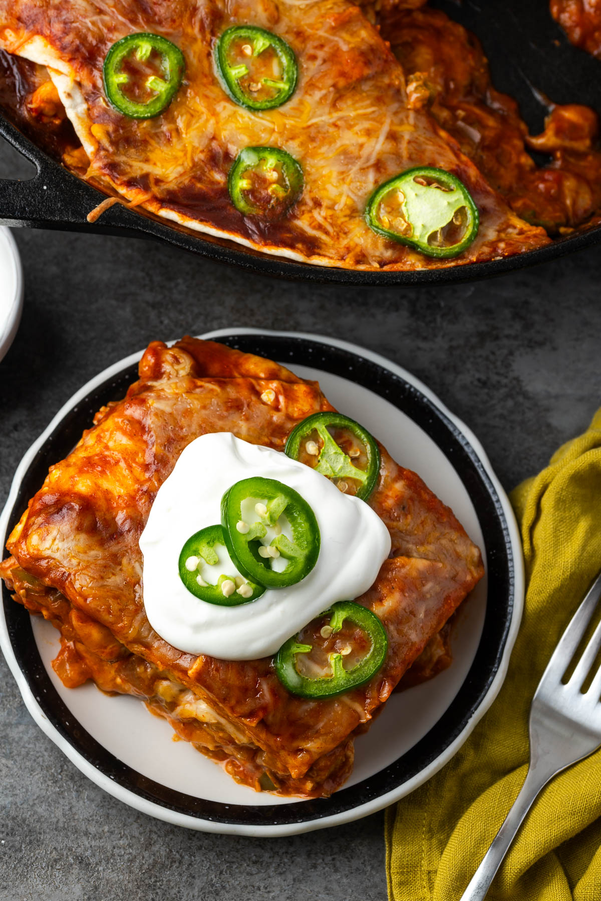 slice of chicken enchilada pie on plate.
