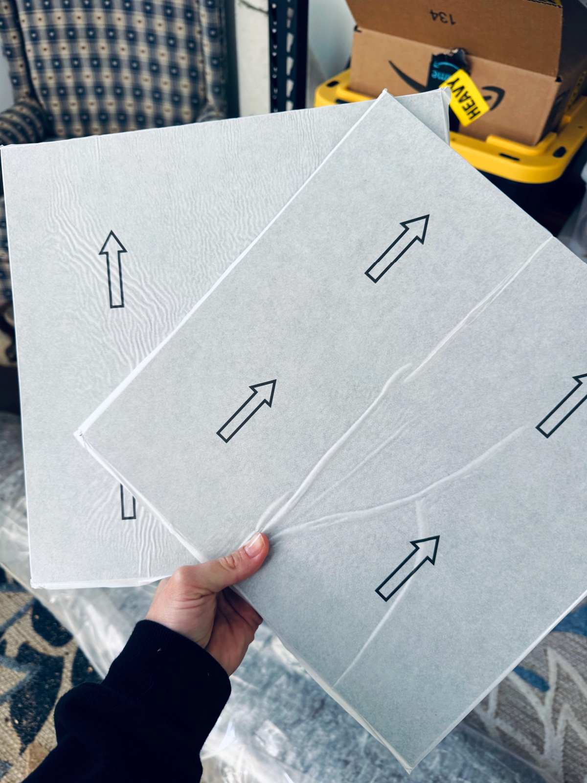 directional arrows on the back of Chris Loves Julia floorpops.