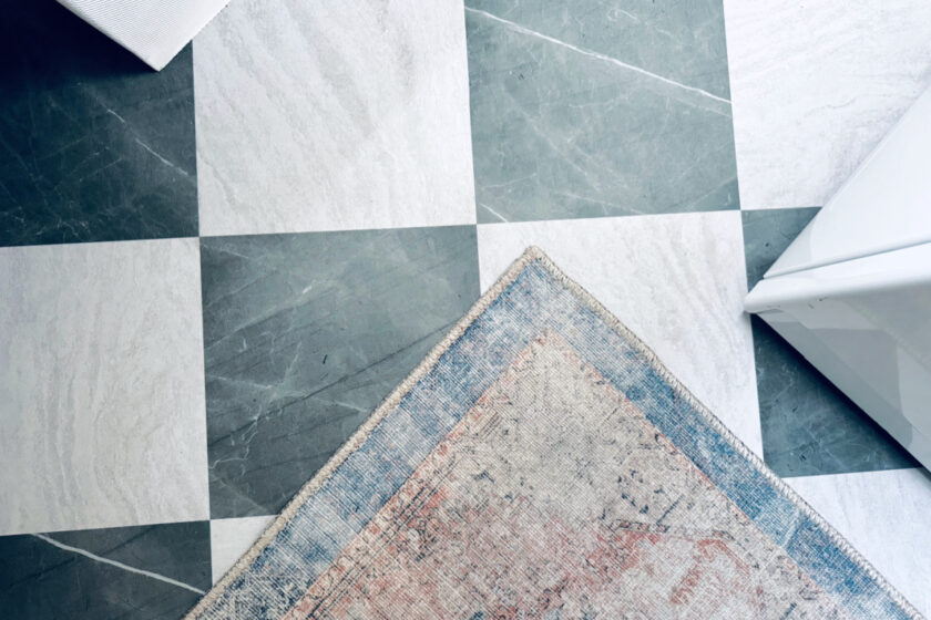 Chris Loves Julia floor pops tile with washable rug.