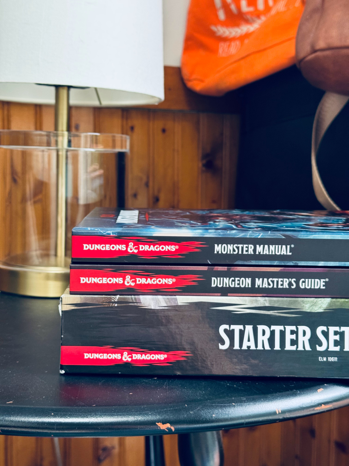 dungeons and dragons books on table.