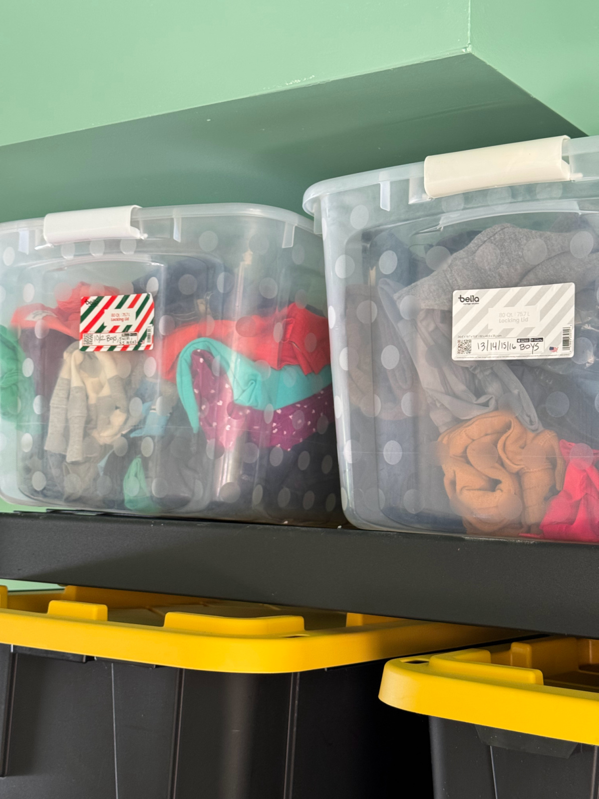 bins full of stored hand-me-downs for kids.