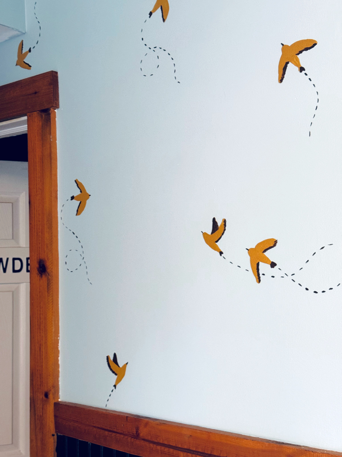 example of finished DIY sparrow wallpaper.