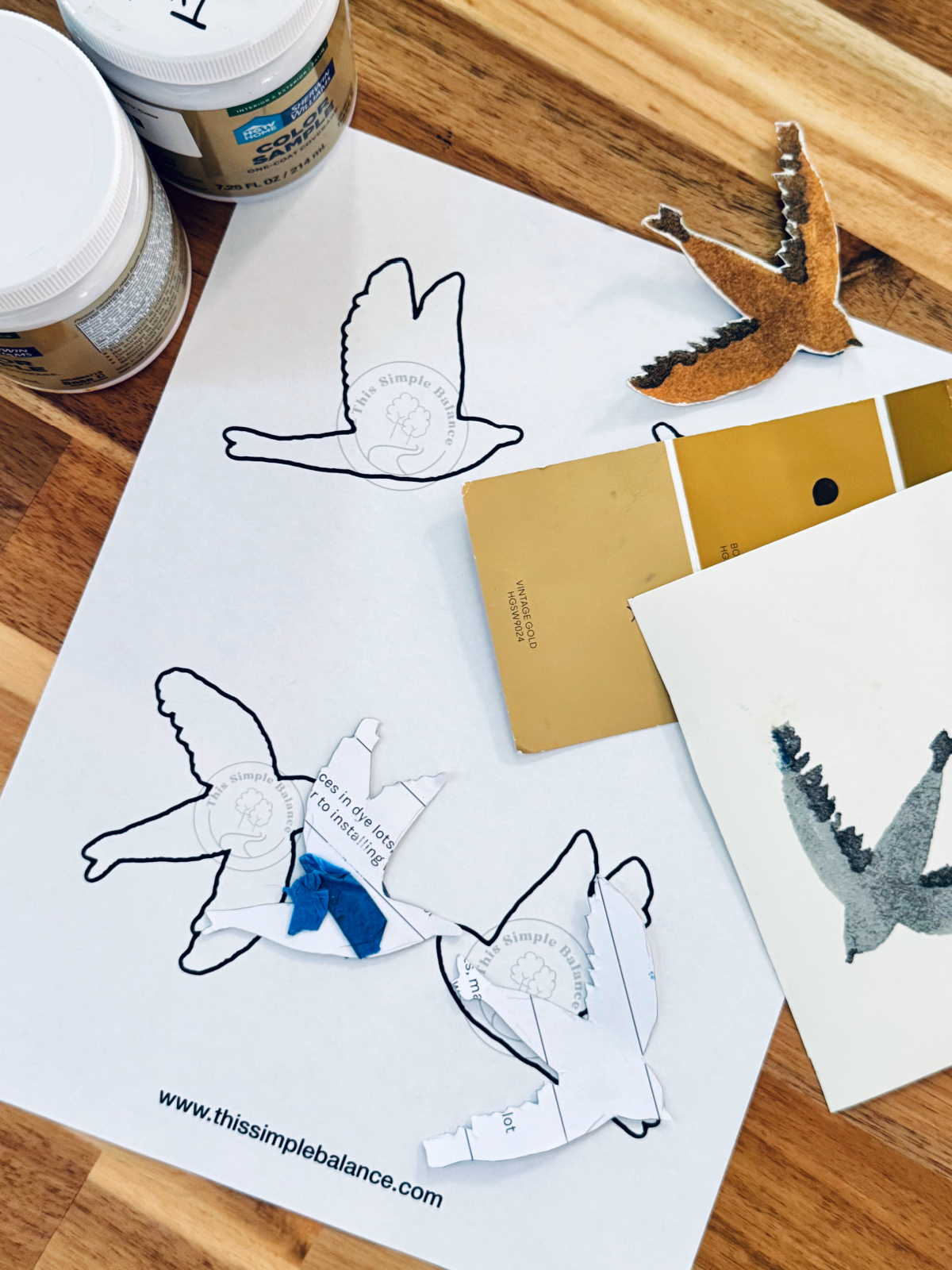 flat lay of supplies for diy sparrow project strewn on table.